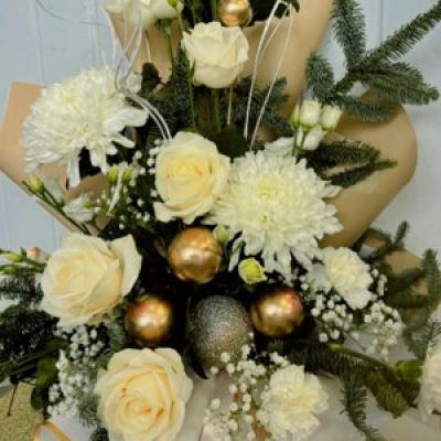 Golden Shimmer - This flower box arrangement is part of our Luxury Christmas range. Bursting with gold bauble decorations, blooms, roses, carnations, lisanthus & foliage.