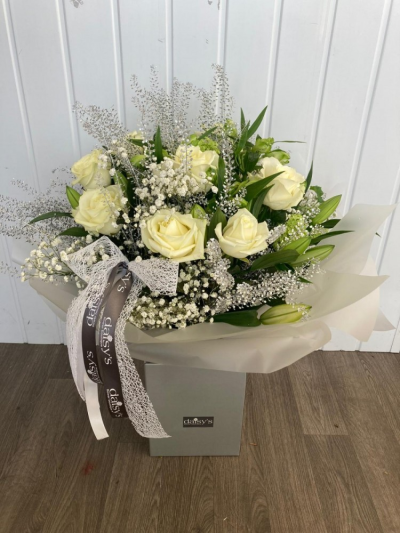 Love You - A gorgeous handtied arrangement in whites & greens bursting with Lillies, Roses, Alstromeria, Lisanthus, Thalaspi & Gypsophila.