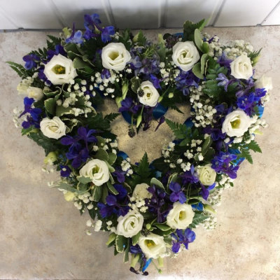 Loose Open Heart - Blue & White - Stunning blue and white open loose heart. Contents include white lisianthus, blue delphinium, gypsophilia and various foliages.