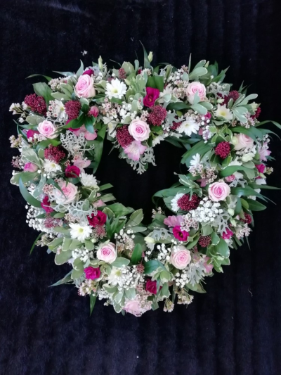 Loose Open Heart - Pink - A beautiful loose open heart in different shades of pinks with a touch of white. Includes Roses and a range of seasonal flowers & foliages
