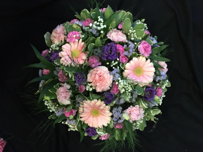 Posy Pad - Pink & Purple - A posy pad funeral tribute in pink and purple colour theme with seasonal flowers and foliages