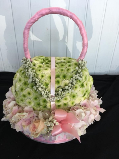 Handbag - A beautiful bespoke handbag floral tribute designed from start to finish by Daisy's. Design and colours can be changed at your request