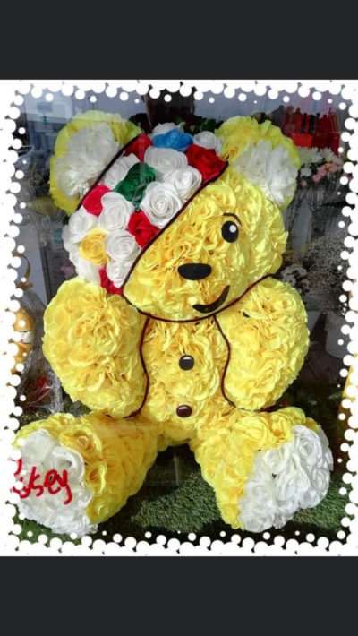 Pudsey Bear - 3D - This beautiful Pudsey Funeral Tribute is made by Daisys from start to finish. It is carefully created to ensure a high quailty tribute is provided.