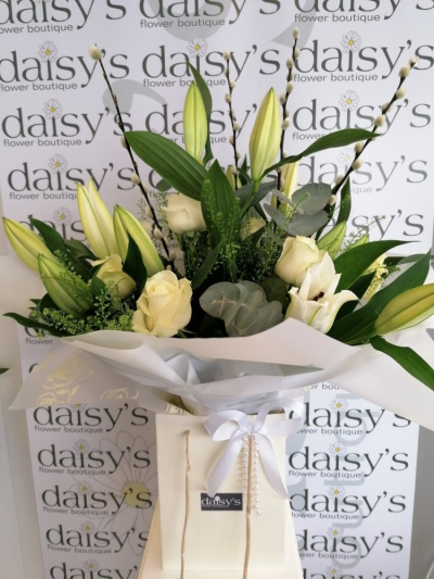White Lily & Rose - A stunning collection of roses and lilies hand-tied and delivered by a local florist.