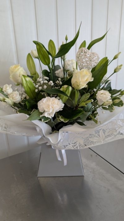 Flower box - Whites & Greens - A beautiful flowerbox to include roses, lisanthus, carnations, lillies, gypsophila & greenery in whites & greens. This arrangement comes in a gift box with a satin bow. Perfect for Mother's Day