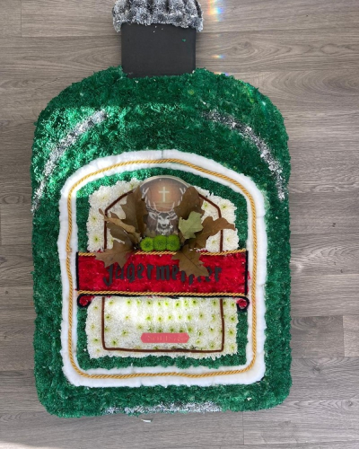 Jagermeister - A Jagermeister 2D bottle funeral tribute designed by Daisys from start to finish. It is carefully created to ensure a high quailty tribute is provided.