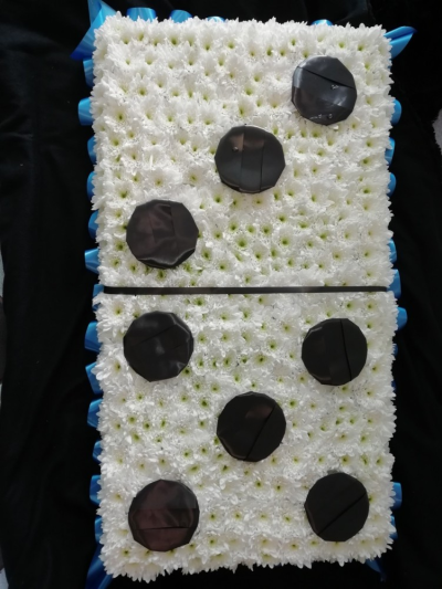 Domino - A 2D Domino Funeral Tribute. The number on the domino can be changed along with the colour ribbon of your choice