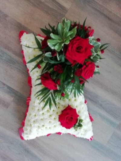 Pillow - Red & White - A beautiful pillow with red ribbon edge, massed in white chrysanthemums and a mixture of red flowers & green foliages.