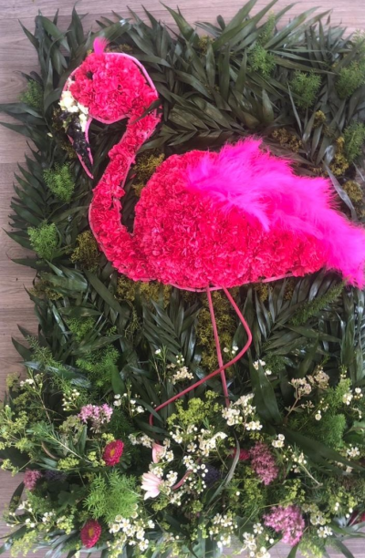 Flamingo - A 2d vibrant pink flamingo picture surrounded by foliage and flowers.