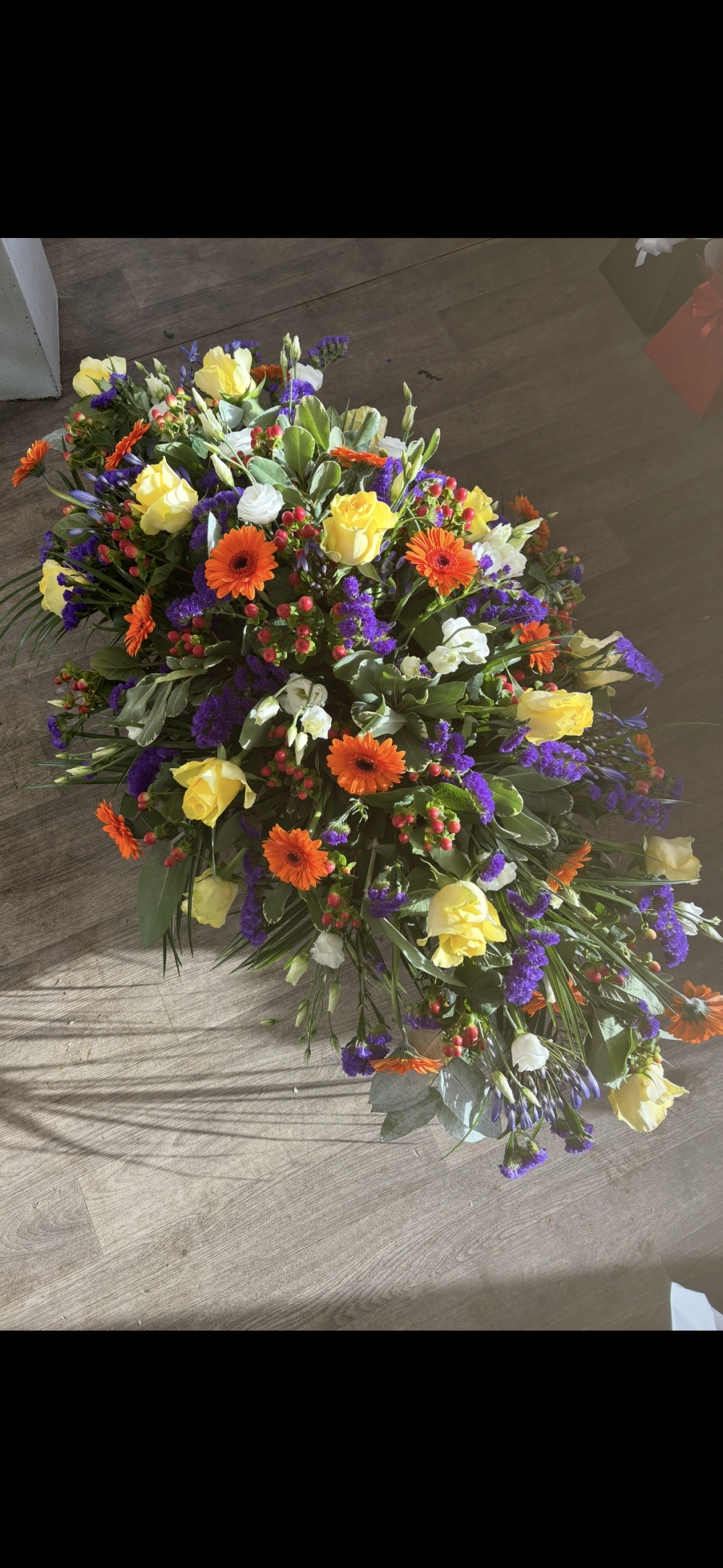 Vibrant casket spray