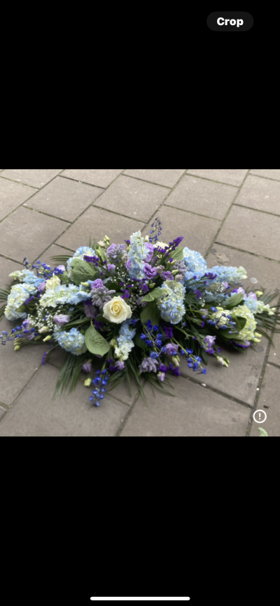 Funeral spray - A beautiful spray in blues,lilacs and creams