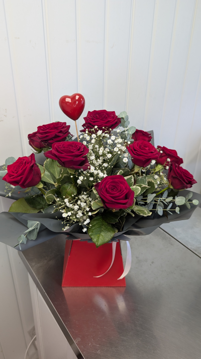 Red Roses - A flower box filled with the luxury red Naomi roses, gypsophila & foliages