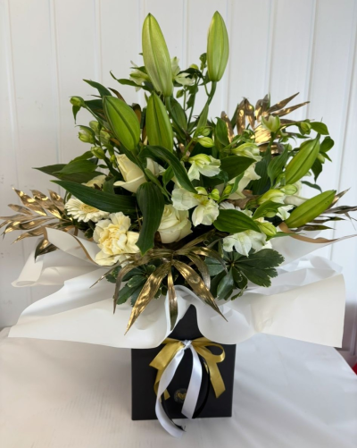 Luxury white & gold - A luxury white & gold arrangement with a mixture of seasonal flowers & foliages