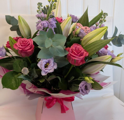 Millie - A Flowerbox bursting with Cerise, lilac & white seasonal flowers