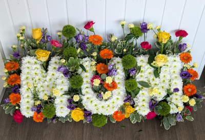 MUM with background - A beautiful Mum lettered tribute with a background of beautiful flowers in a range of colours.

Colour theme can be changed to your chosen colours
