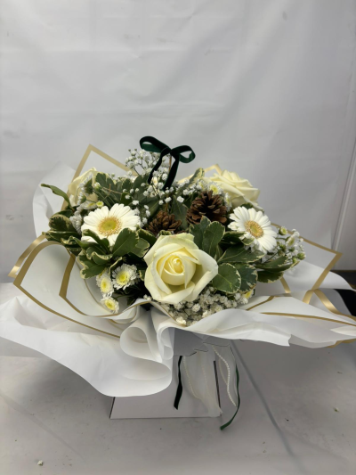 Denver - A stunning Christmas Flowerbox with flowers in white & green theme; finished with a satin bow & some cones