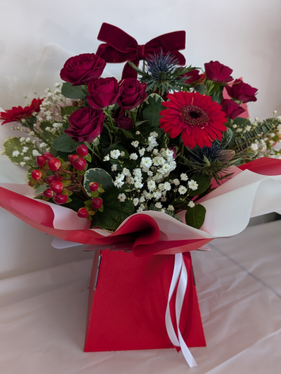 Christmas No1 - A Christmas themed flower box with seasonal flowers
