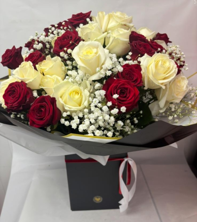 50 Roses - A mixture of red & white roses with gypsophila